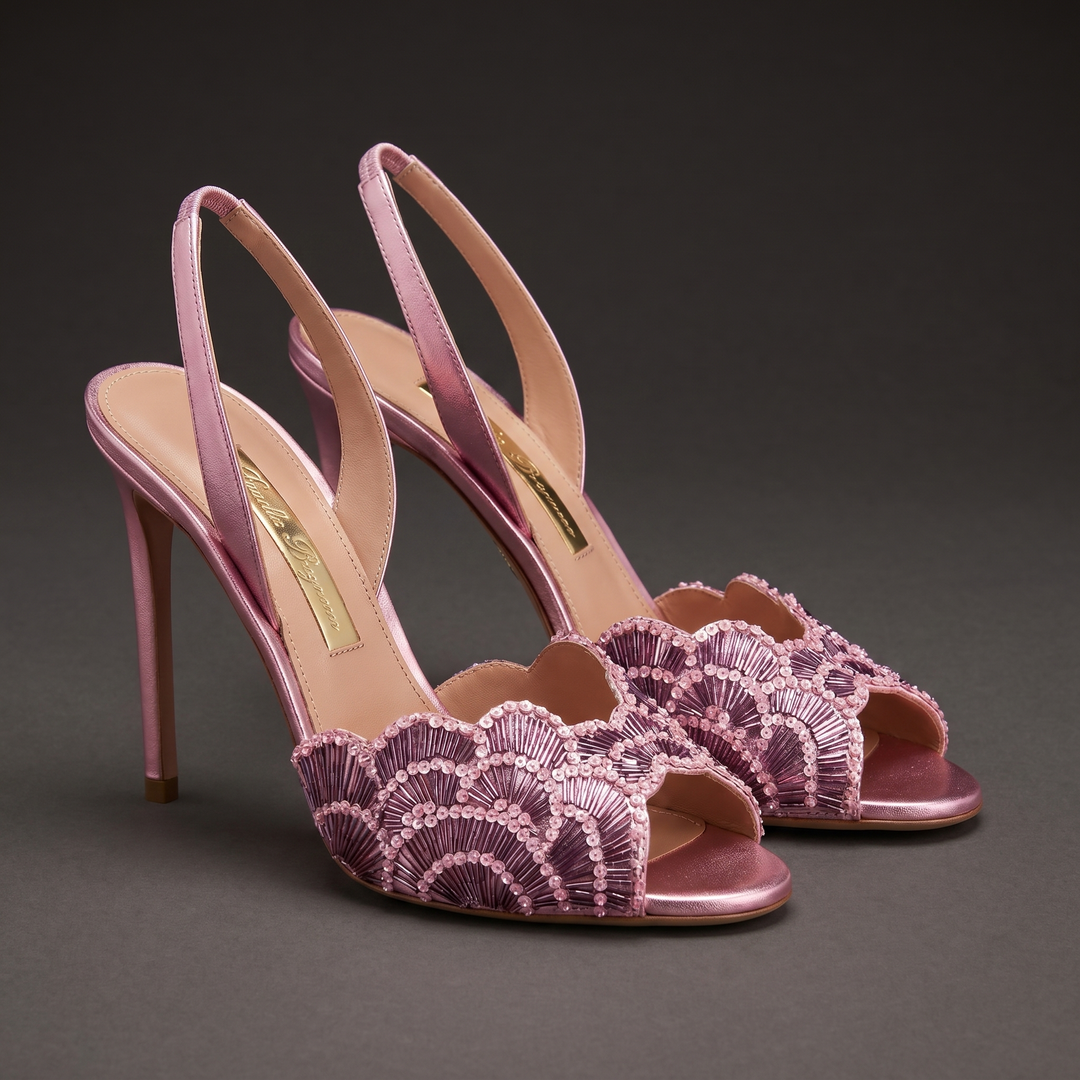 Close-up of embellished peacock design on elegant women's stiletto heel for formal events.