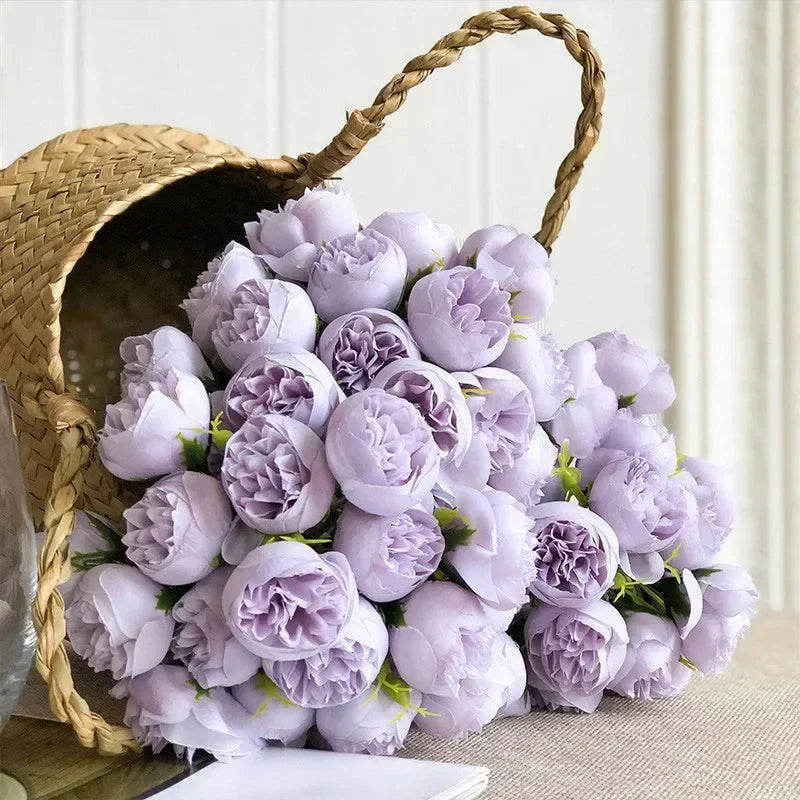 Lush faux peony flower arrangement, enhancing romantic home decor or event settings with lasting beauty.