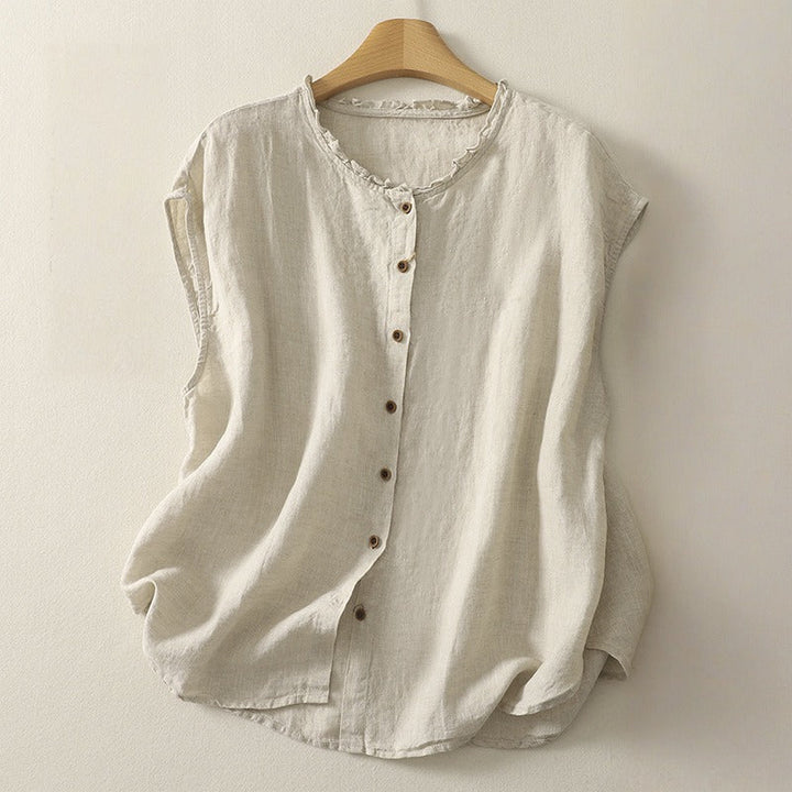 Women's elegant sleeveless top & cardigan. Flowy design, versatile for casual summer outings or stylish workwear.