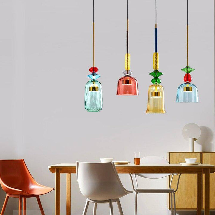 Stylish colored glass pendant light, perfect LED fixture for contemporary dining rooms.