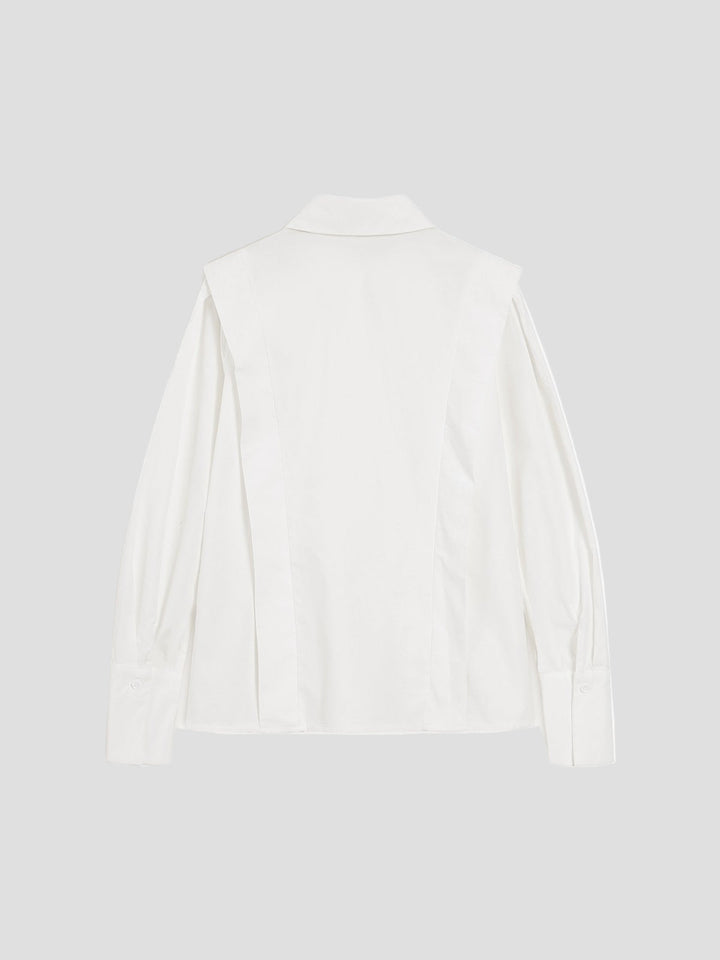 Chic women's square neck top, button down design, ideal for casual or professional looks.