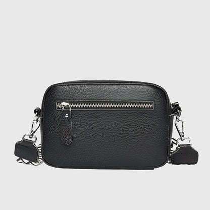 Versatile women's shoulder bag in synthetic leather, an organized everyday handbag.