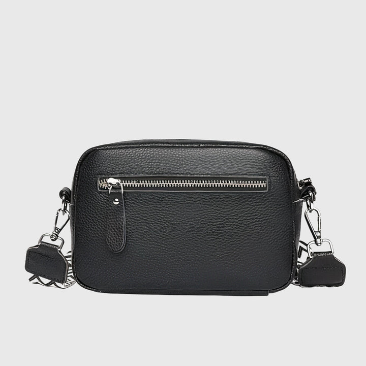 Versatile women's shoulder bag in synthetic leather, an organized everyday handbag.