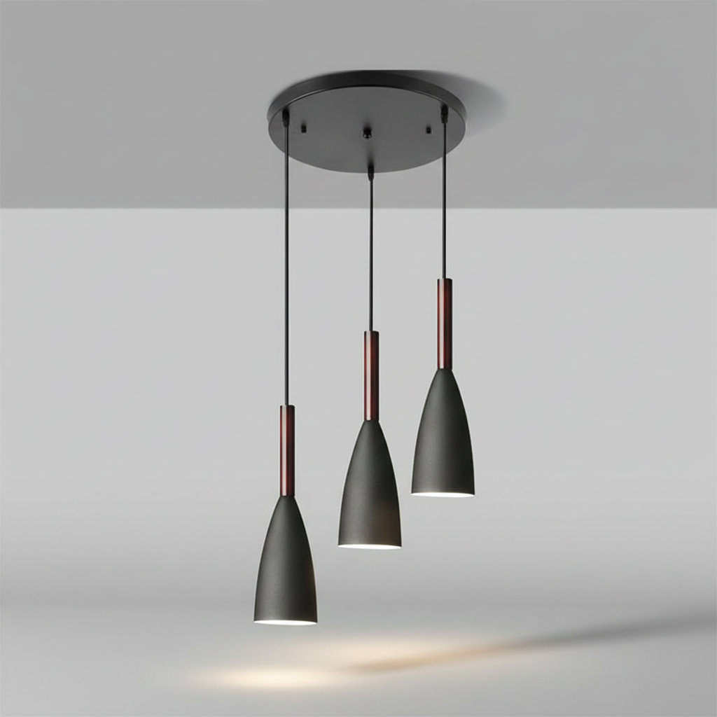 Bright triple pendant light, ScandiBeam, creating warm ambiance in dining rooms.