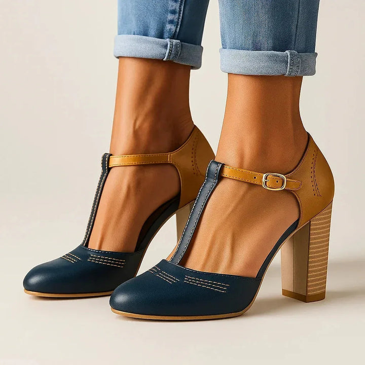 Fashionable two-tone block heel pumps, designed for women's comfort and elegant footwear style.