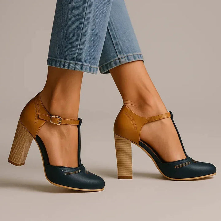 Women's two-tone block heel pumps, a comfortable and stylish choice for versatile daily footwear.