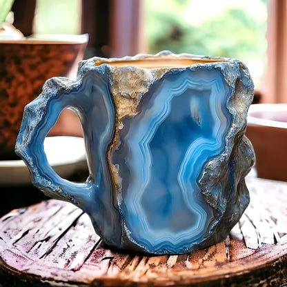 Artistic shot of a colorful resin coffee mug with a captivating crystal-like design, a perfect gift.