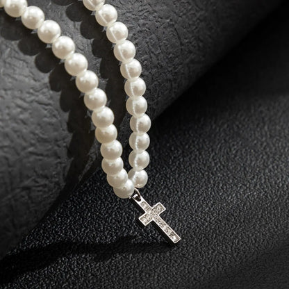 Adjustable unisex pearl cross pendant necklace, a stylish religious fashion accessory for any elegant look.
