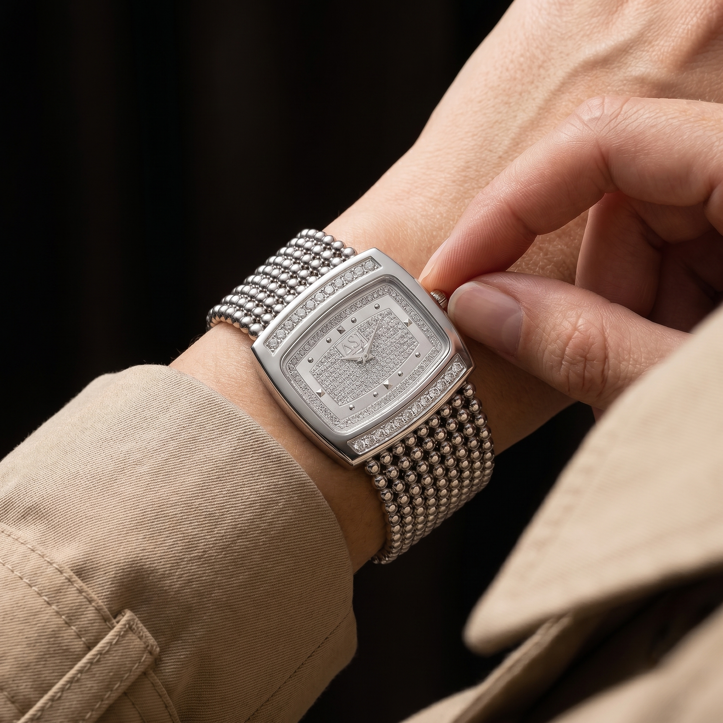 Close-up of a classic stainless steel unisex watch showcasing its durable build and elegant dial.
