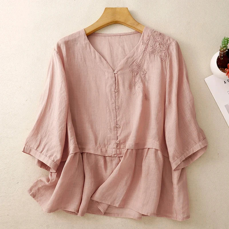 Chic women's V-neck button-front blouse, long sleeve & relaxed fit, ideal for elegant office or casual styling.