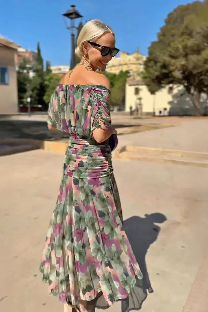 Women's elegant V-neck maxi dress with pleated waist, ideal evening gown for formal events & weddings.