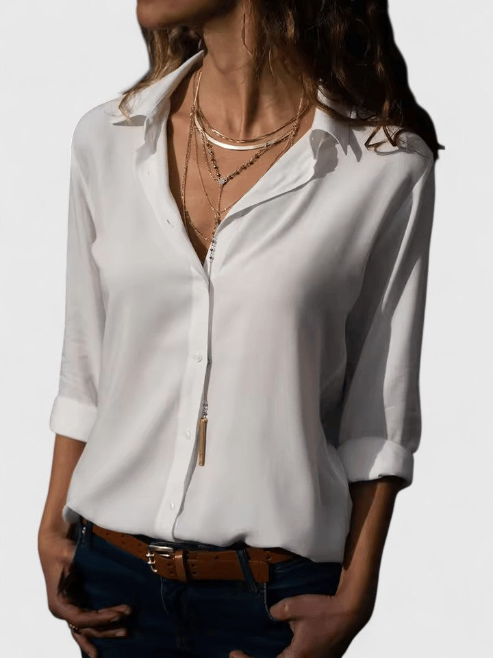 Flattering V-neck blouse for women, an elegant top for professional work or relaxed casual wear.