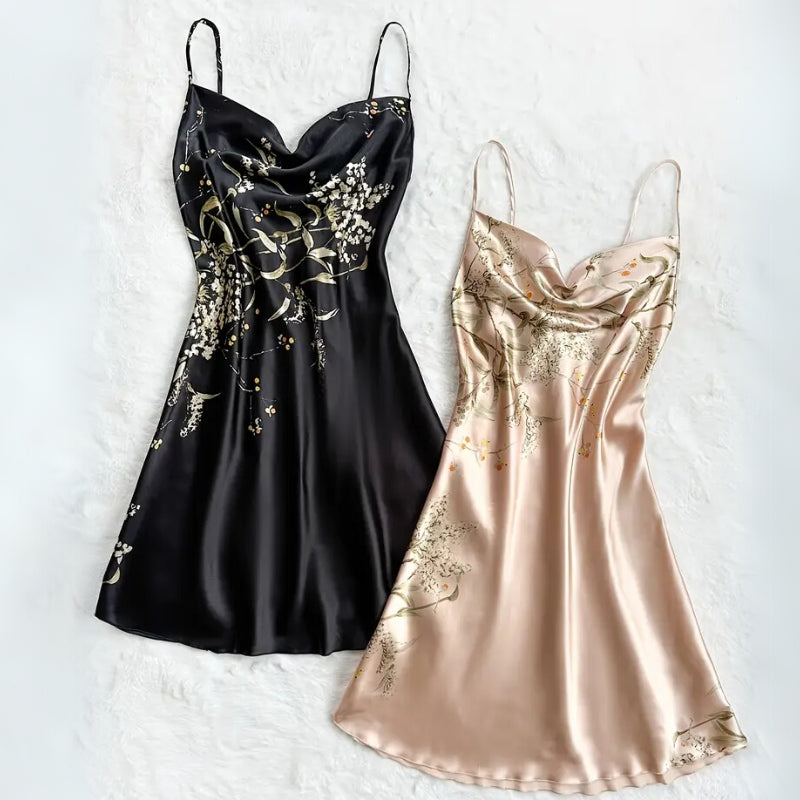 Soft women's floral nightdress with a draped neckline & botanical print, ideal for elegant and comfortable intimate apparel.