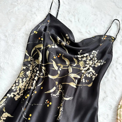 Velina floral women's nightdress featuring a relaxed fit, adjustable straps, & elegant botanical print for comfortable sleep.