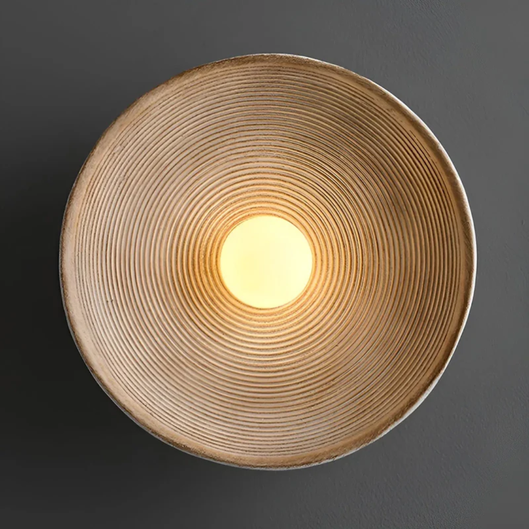 ZenGlow Wabi-Sabi disc wall lamp, creating a tranquil Japanese ambient light for peaceful home decor.