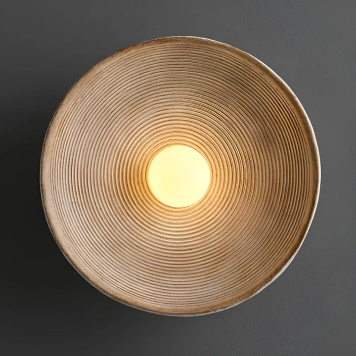 ZenGlow Wabi-Sabi disc wall lamp, creating a tranquil Japanese ambient light for peaceful home decor.