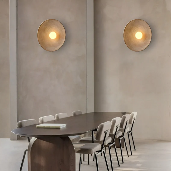 Close-up of Wabi-Sabi disc wall lamp, showcasing its unique texture and elegant Japanese modern lighting design.