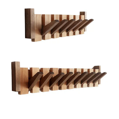 Artistic piano design coat rack, wall-mounted to enhance home decor and provide organized storage.