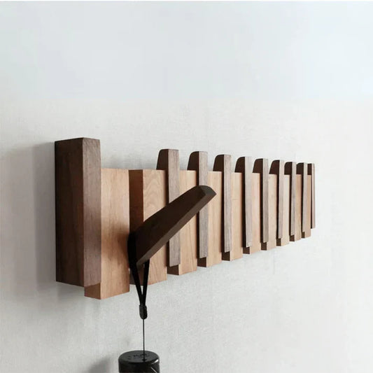 Elegant wall mounted wooden piano coat rack with 8 hooks for stylish entryway organization.