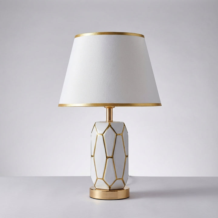 Modern vintage style ceramic lamp with a neutral fabric shade, enhancing any home's ambient light.