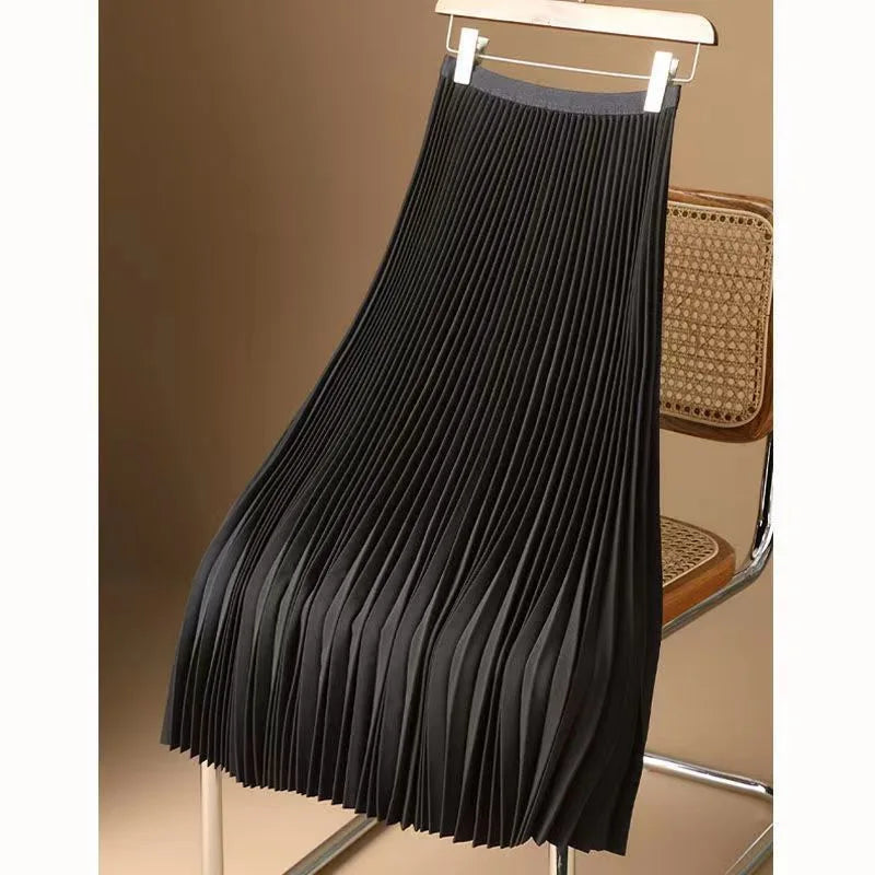 Elegant white flowy pleated midi skirt for women, perfect for versatile all-season chic fashion.