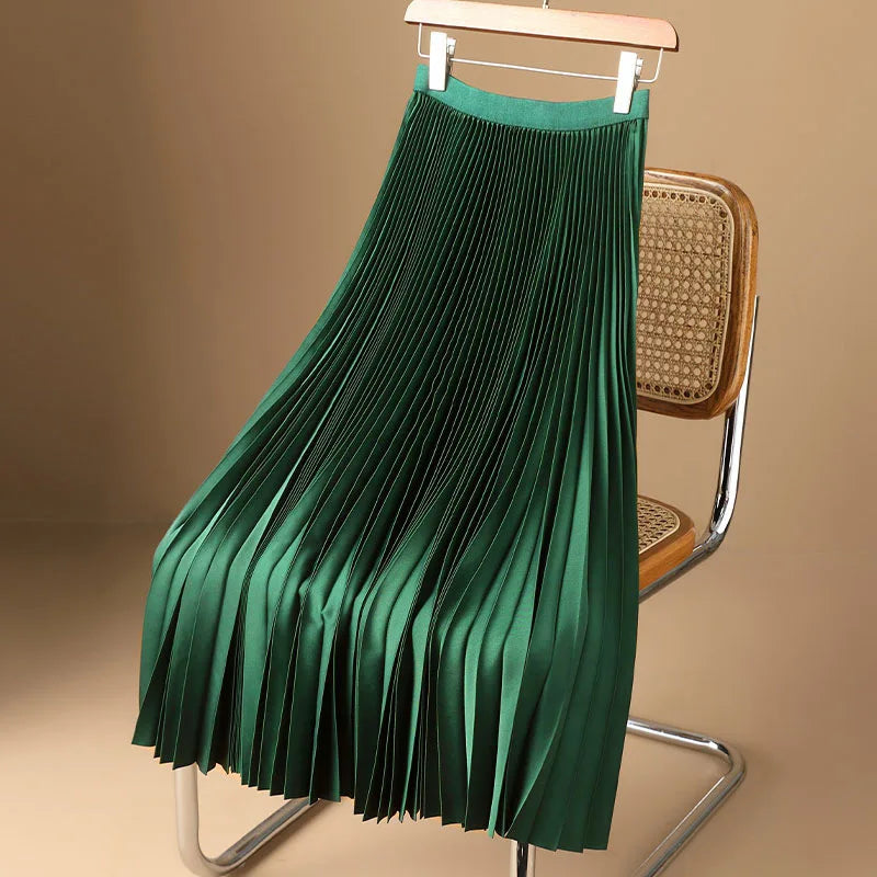 Women's silver elegant flowy pleated midi skirt, a chic and versatile fashion essential for effortless style.