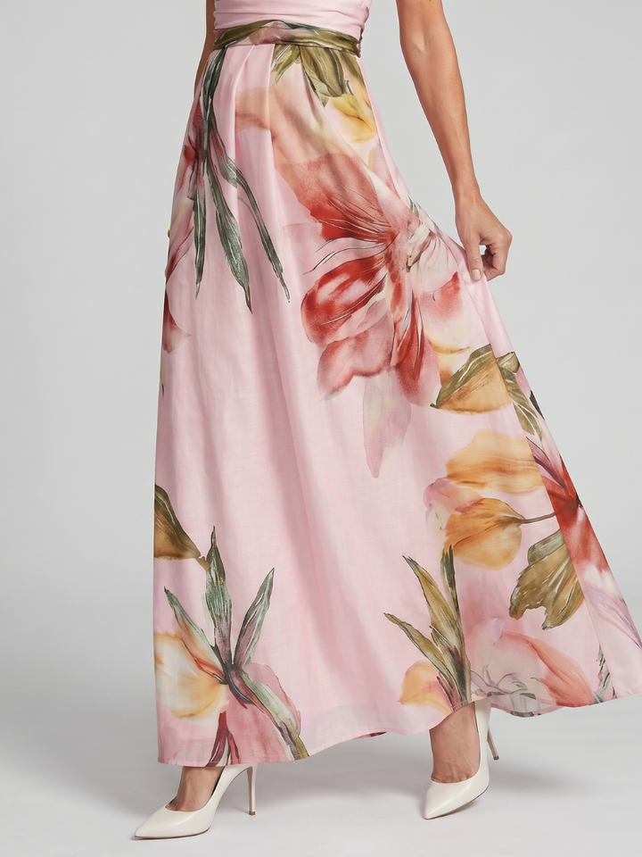 White flowy halter maxi dress for women, elegant and versatile for summer style, beach or casual vacation wear.