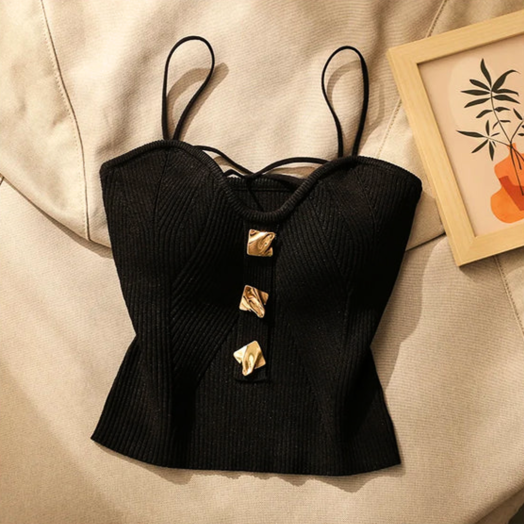 Black sculpted corset top for women, featuring adjustable straps and a modern, chic design.