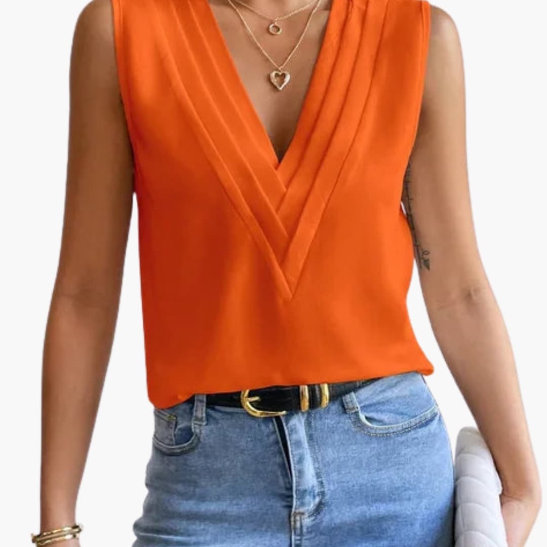 Chic women's V-neck sleeveless summer blouse. Comfortable, versatile for elegant office or casual outings.
