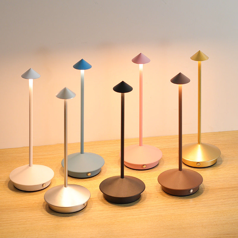 Stylish wireless LED lamp. Dimmable, touch-controlled, and rechargeable for elegant, portable lighting.