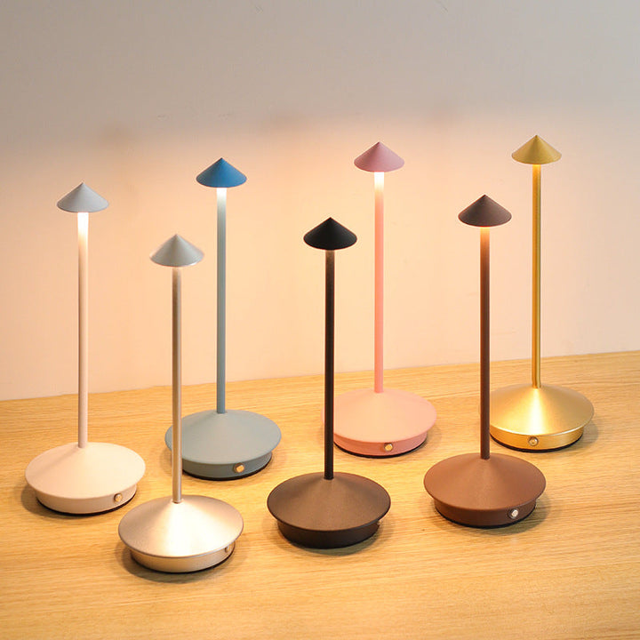 Stylish wireless LED lamp. Dimmable, touch-controlled, and rechargeable for elegant, portable lighting.
