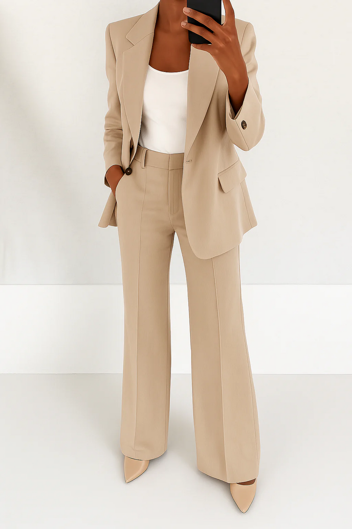 Formal women's coordinated suit set featuring a smart blazer and stylish wide-leg trousers for professional attire.