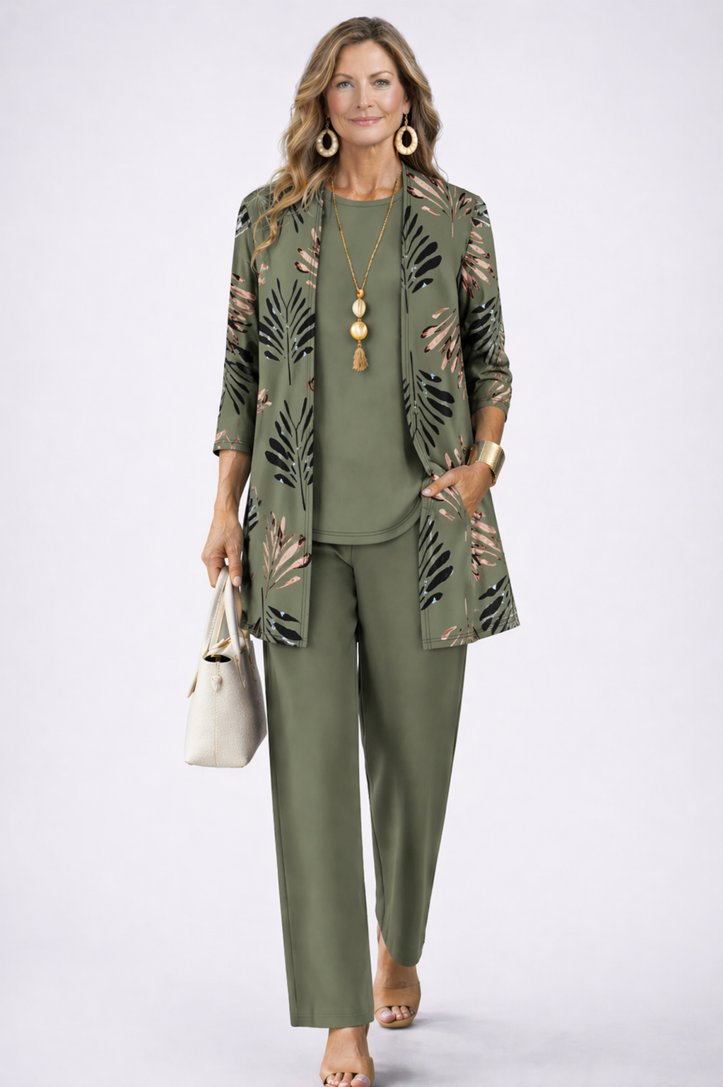 Elegant women's 3-piece blazer, top & trousers set. Perfect for business casual or chic events.