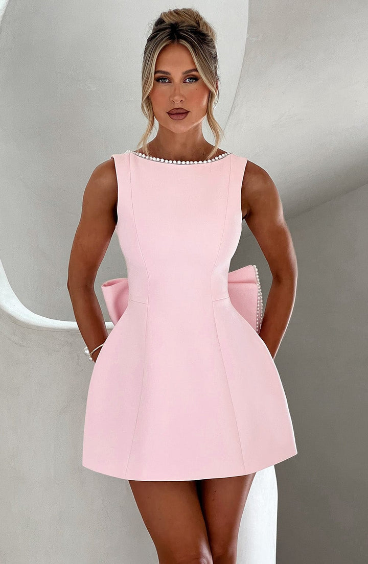 Elegant women's A-line mini homecoming dress with delicate pearl trim, perfect for special occasions.