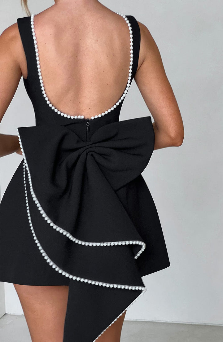 Graceful women's A-line short dress with exquisite pearl trim, suitable for homecoming or parties.