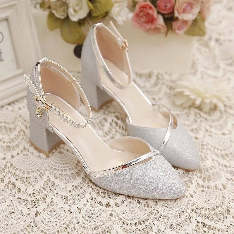 Versatile women's block heel pumps with supportive ankle strap, offering comfort for all-day wear.