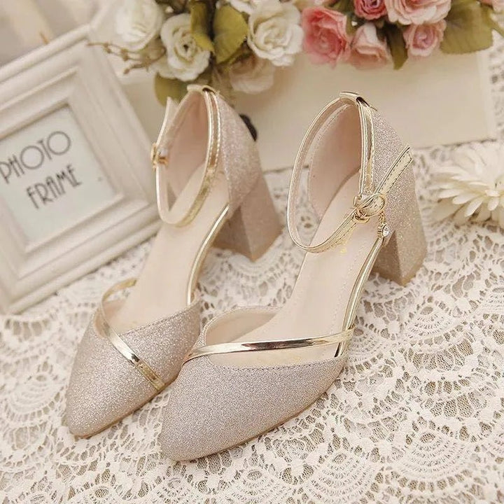 Fashionable women's dress shoes: ankle strap block heel pumps, offering stability and style for events.