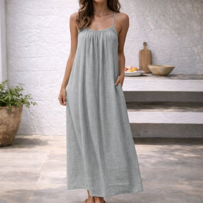 Flowy and feminine backless cami dress for women, elegant and comfortable for summer evenings.