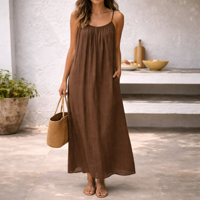 Chic brown backless cami dress, flattering design for women, ideal for elegant casual or party events.