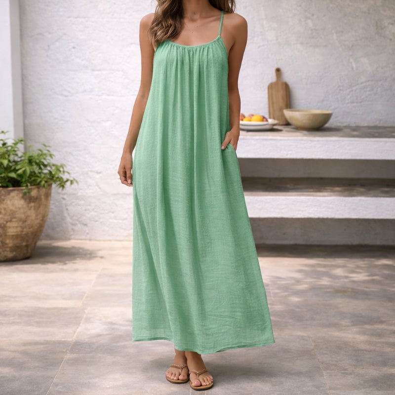 Versatile women's backless cami dress, chic for evening wear or elegant casual outings.