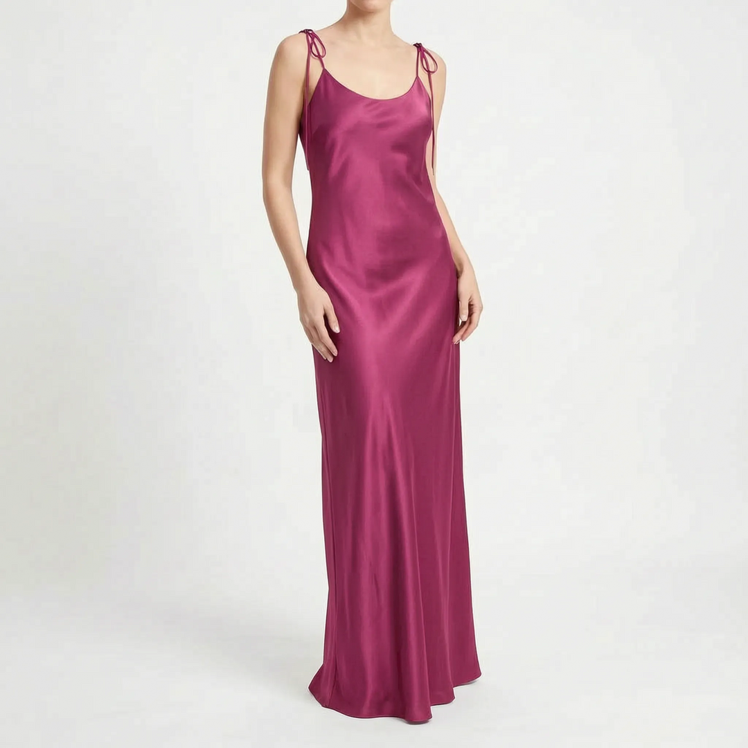 Stunning women's backless floor-length formal gown, sleeveless with a flattering V-neck cut.