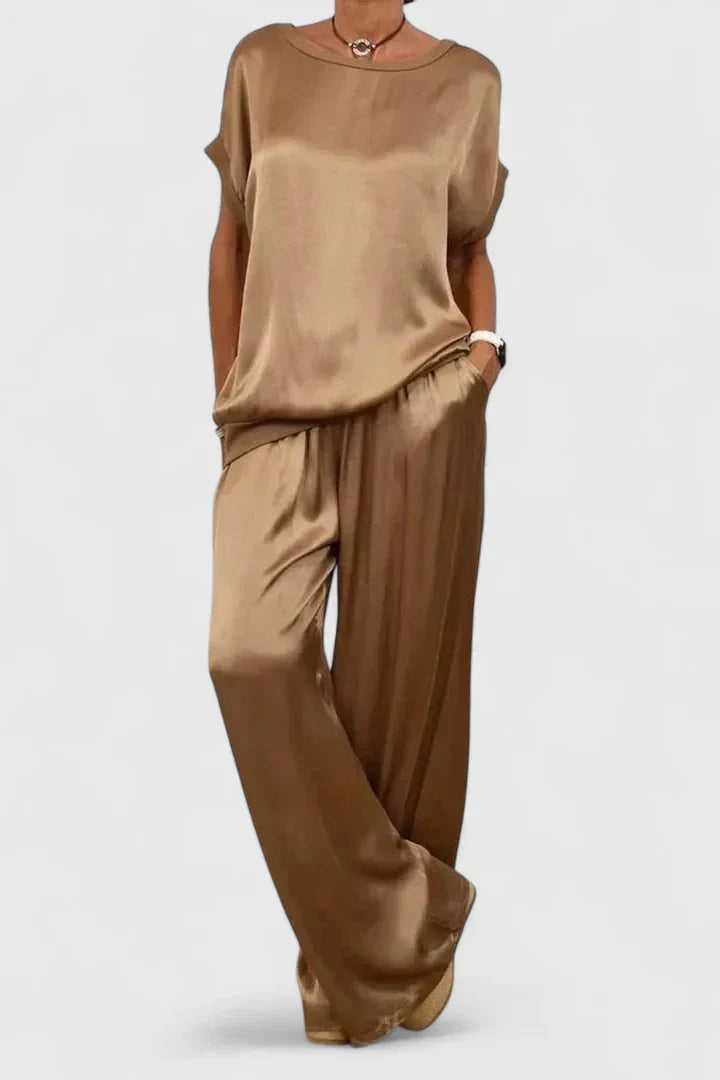 Stylish women's batwing top and wide leg pant set, an elegant two-piece outfit suitable for lounge or travel.