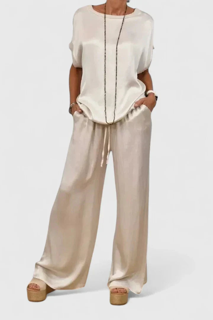 Sophisticated women's matching set: a batwing top and elegant wide leg pants for a comfortable, versatile look.
