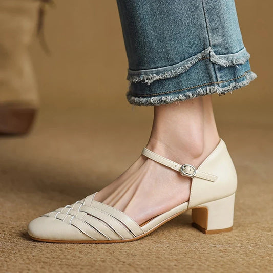 Elegant women's beige block heels with adjustable ankle strap, perfect for office or party wear.