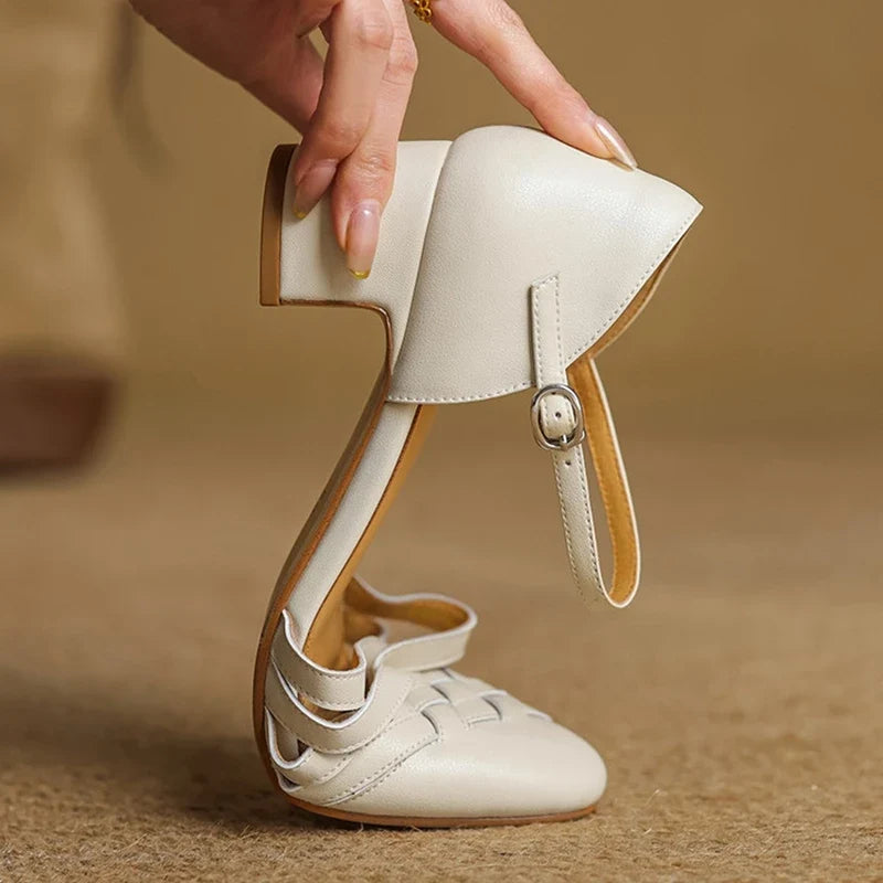 Chic women's dress shoes: beige block heels with an adjustable ankle strap for comfort.