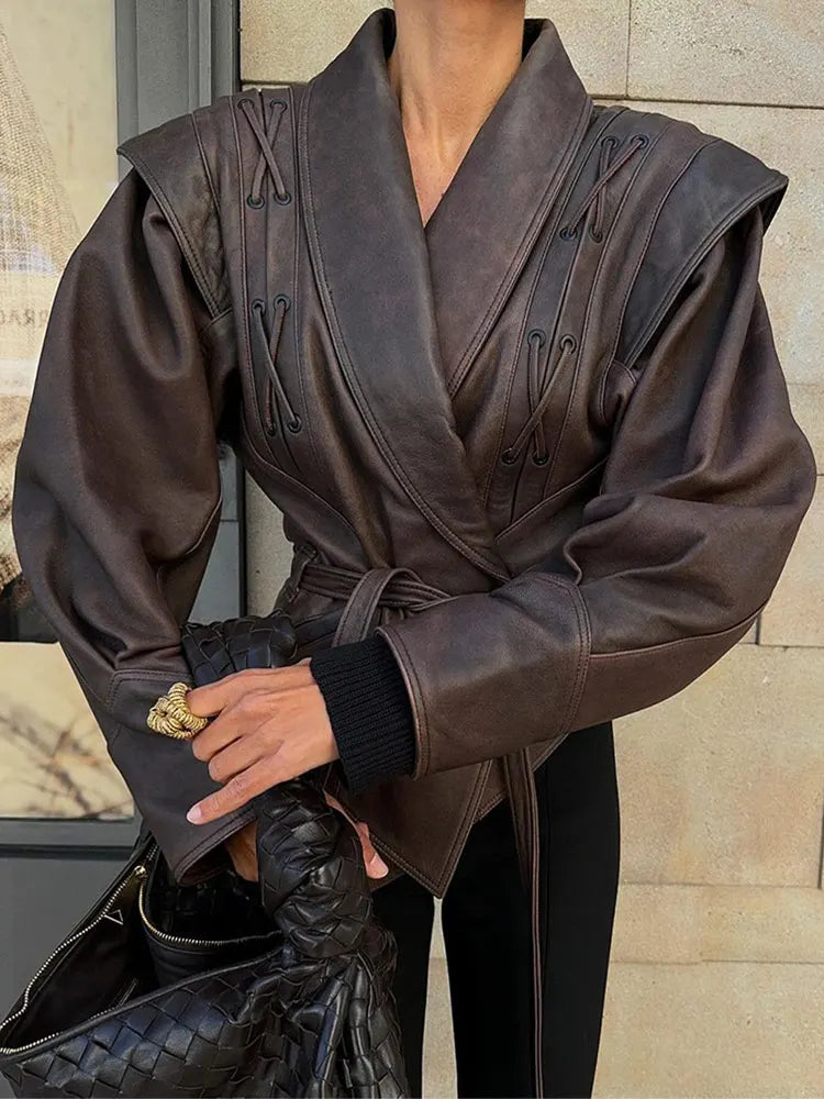Elegant women's belted jacket, perfect for timeless fall fashion. Chic outerwear for versatile styling.