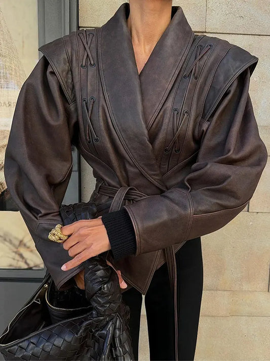 Elegant women's belted jacket, perfect for timeless fall fashion. Chic outerwear for versatile styling.