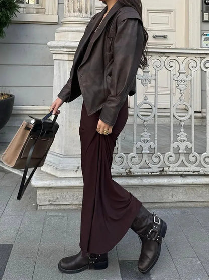 Timeless women's belted jacket, an elegant wardrobe staple. Perfect outerwear for a chic, classic look.
