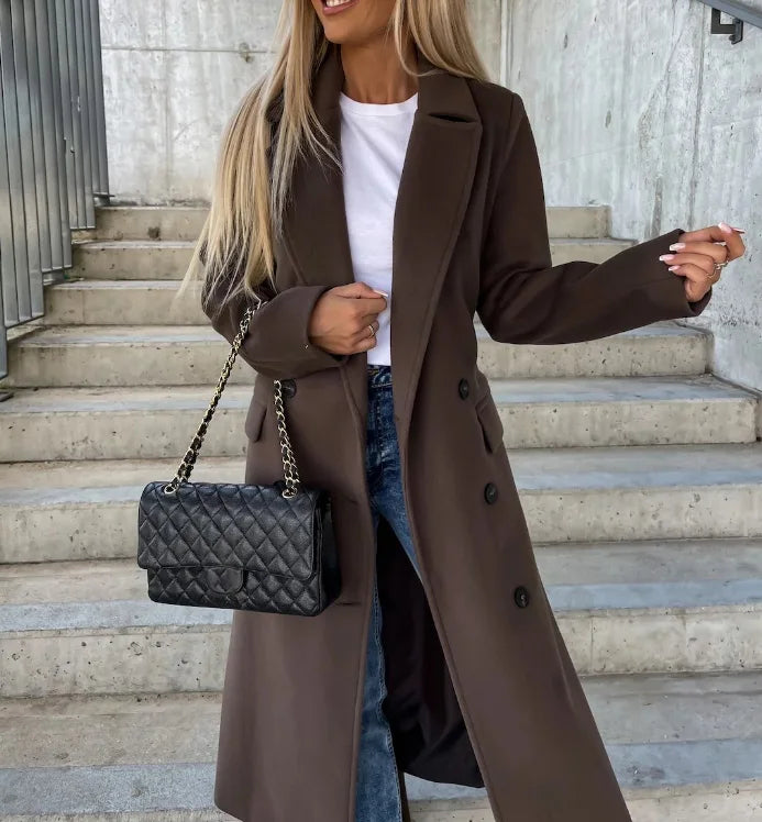 Black women's tailored long belted coat, sophisticated office attire & structured fall/winter outerwear fashion.
