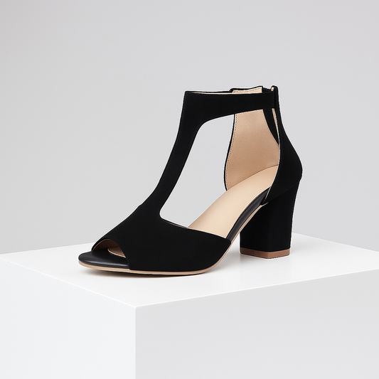Elegant women's black block heels with t-strap, open toe. Comfortable, stable for party or formal wear.
